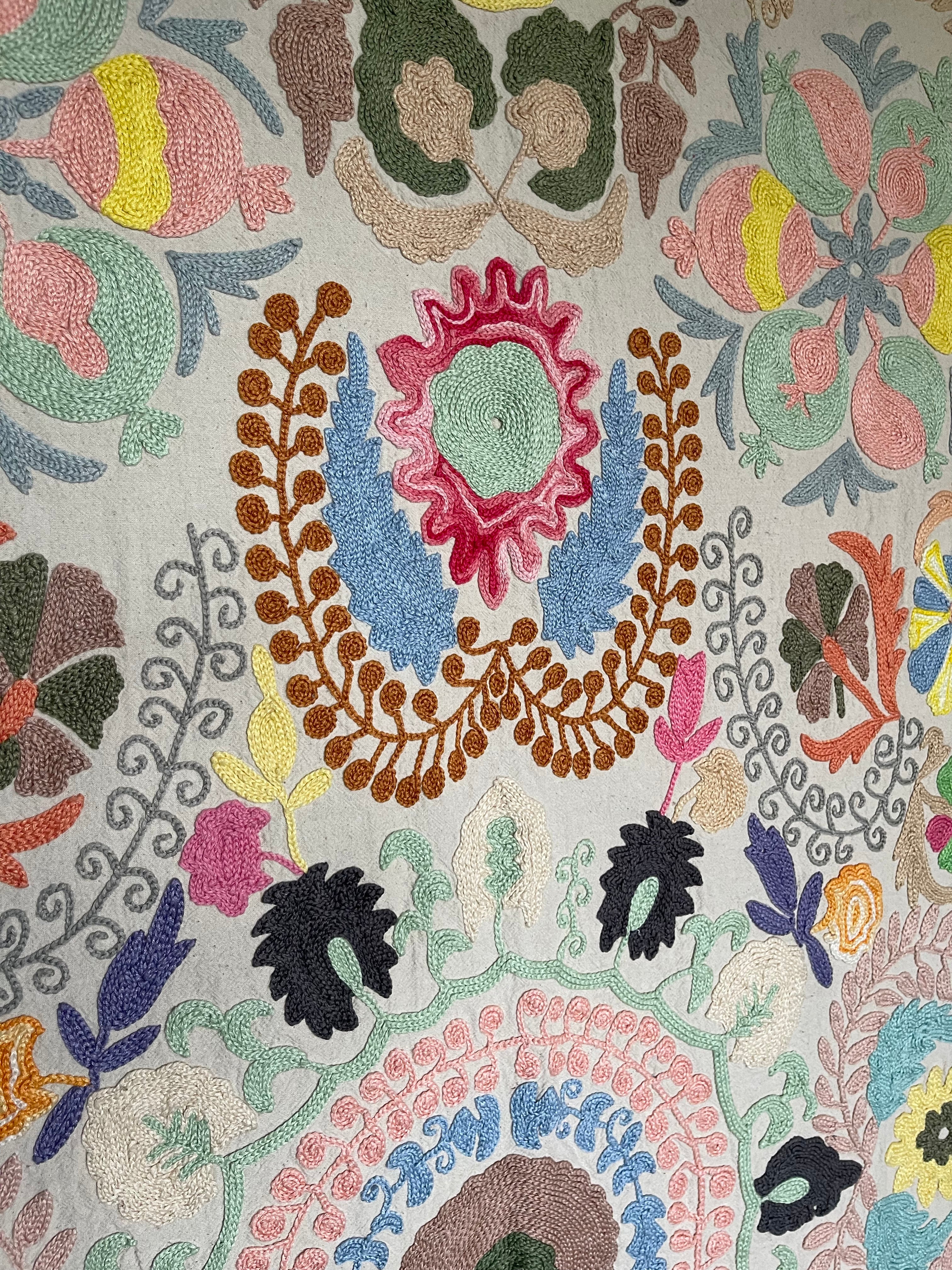 Hand embroidered suzani on beautifully weighted natural coloured cotton.