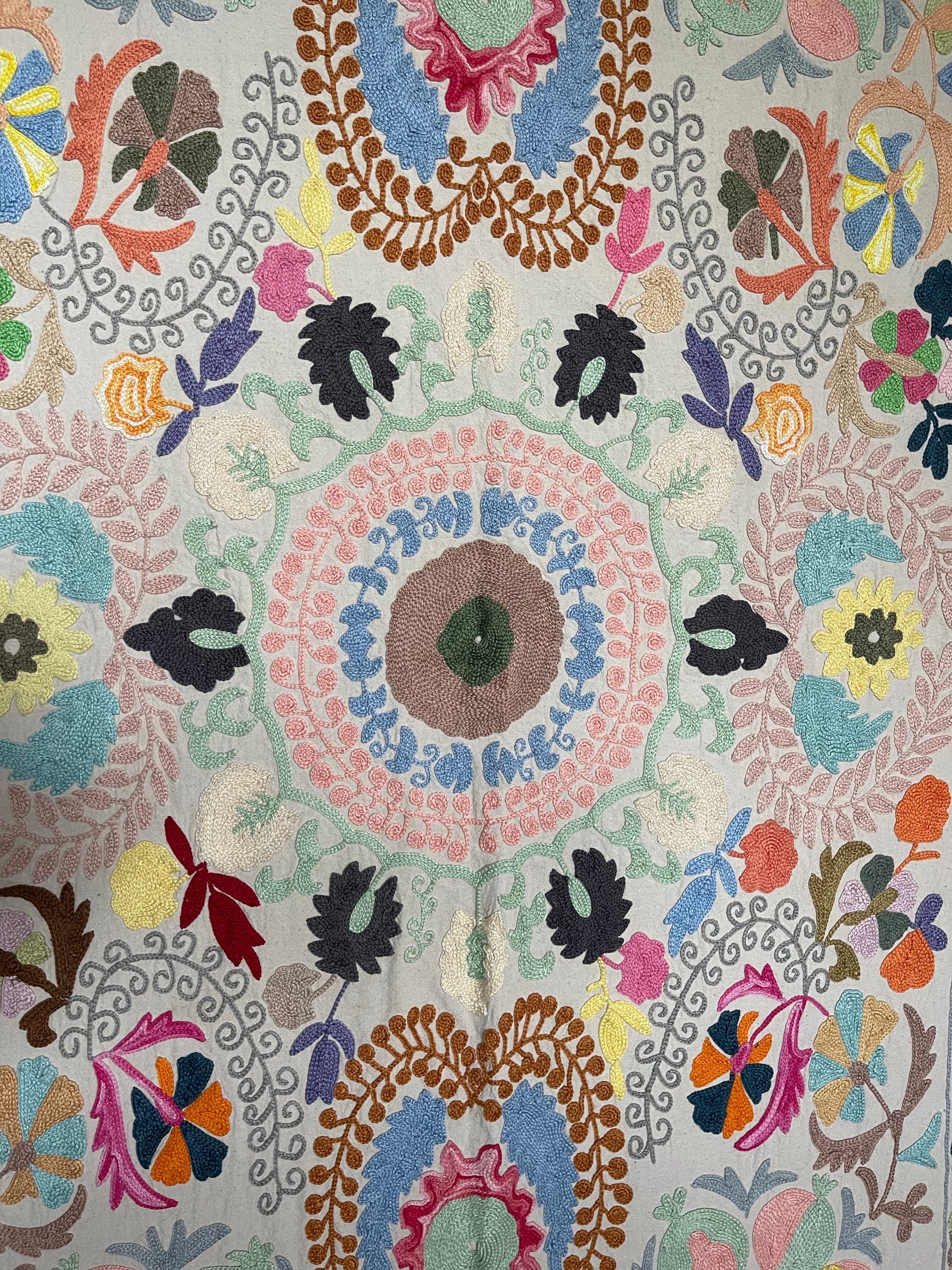 Hand embroidered suzani on beautifully weighted natural coloured cotton.