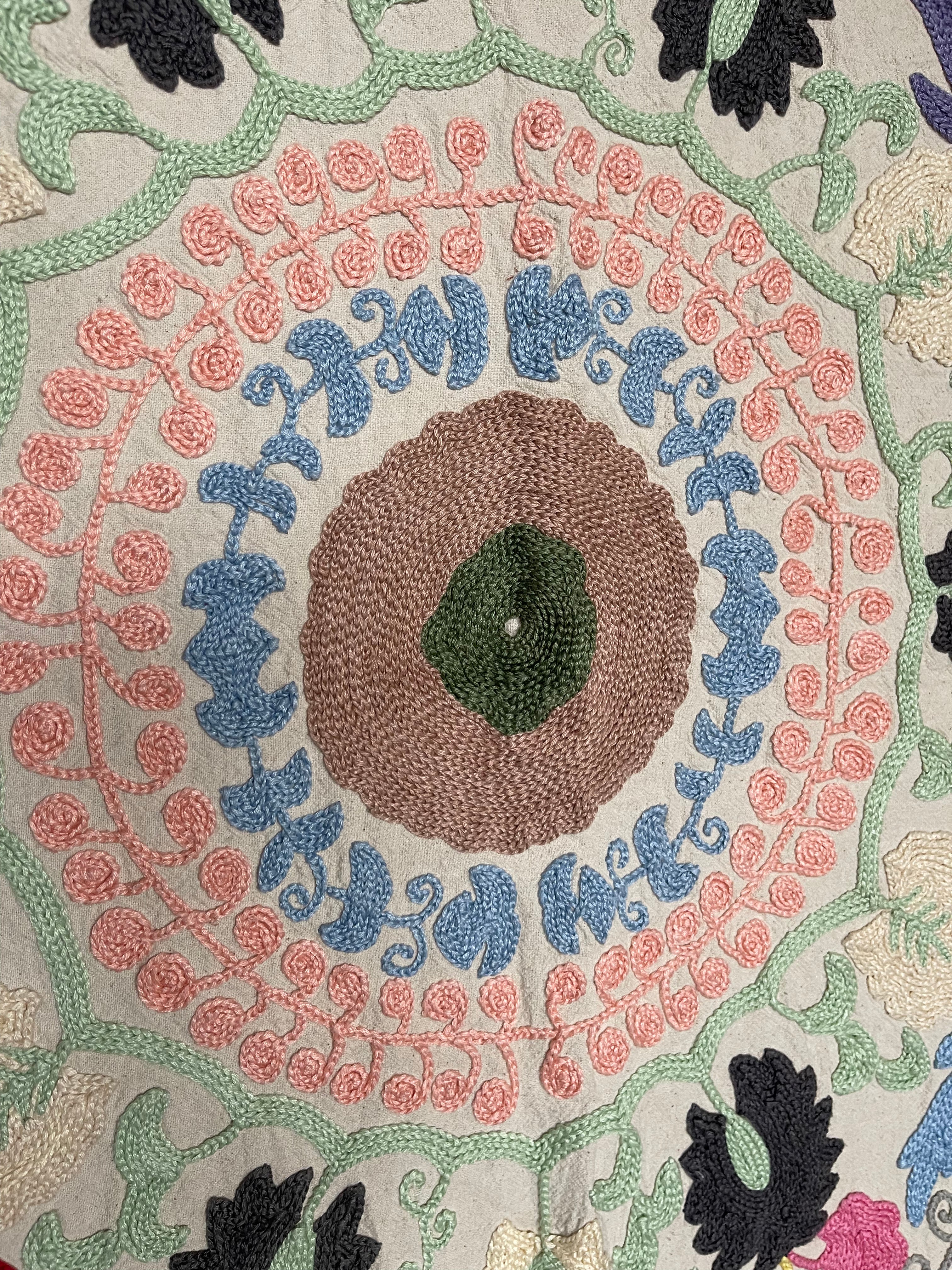Hand embroidered suzani on beautifully weighted natural coloured cotton.