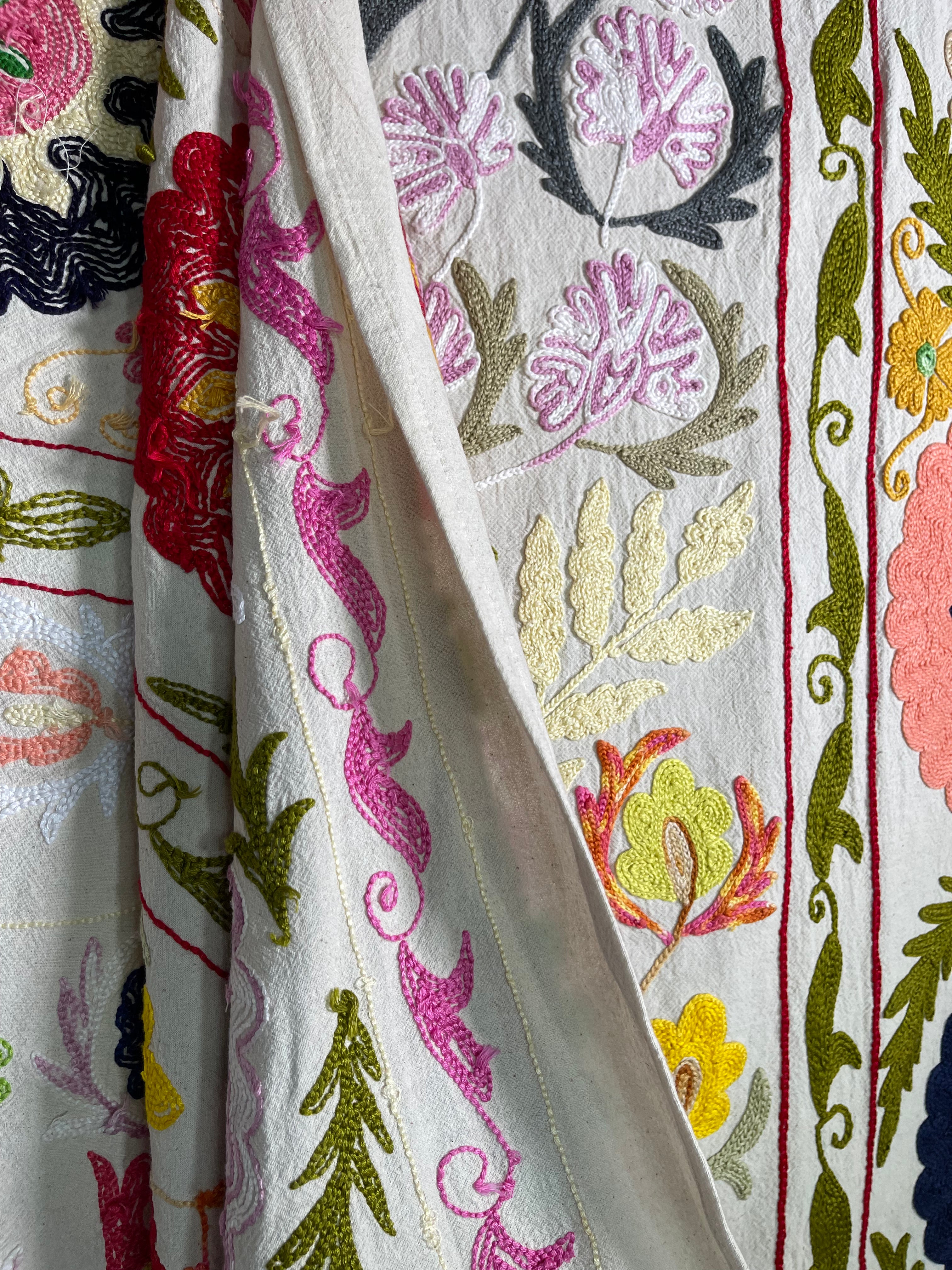 Hand embroidered suzani on beautifully weighted natural coloured cotton.