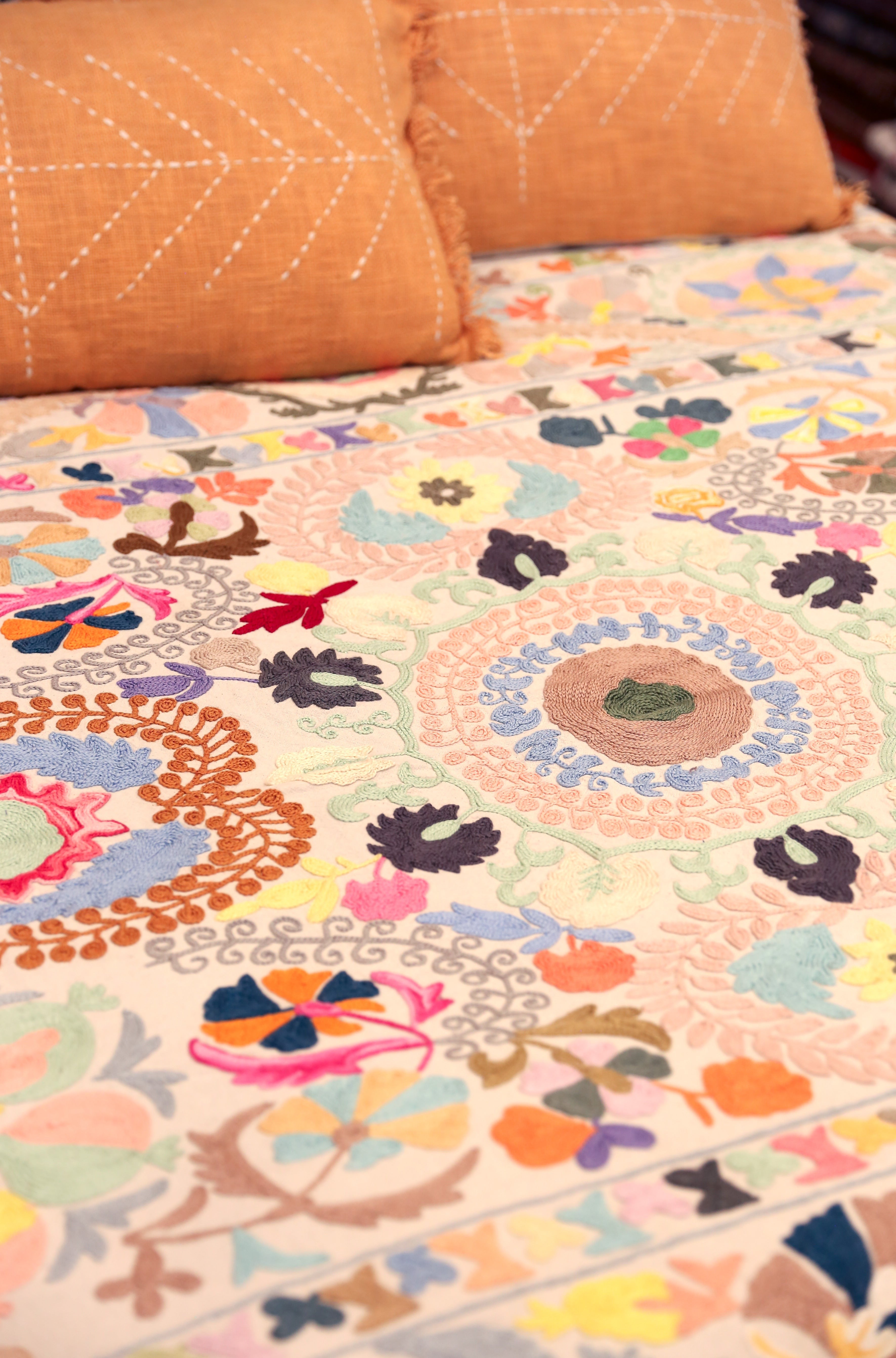 Hand embroidered suzani on beautifully weighted natural coloured cotton.
